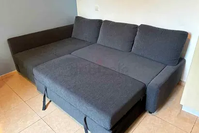 Grey L-shaped Sofa Bed with Storage — Good Condition