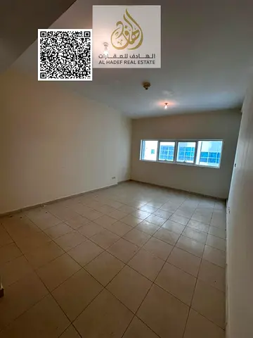 Two-bedroom apartment with a living room for annual rent in Ajman One Towers, Al Rashidiya 3