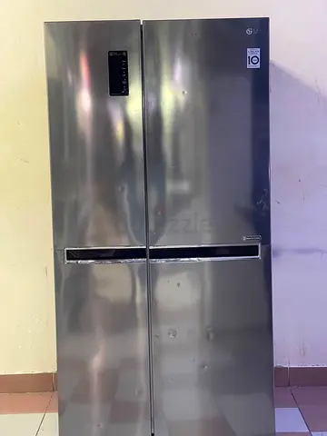 LG Stainless Steel Side-by-Side Refrigerator - Good Condition