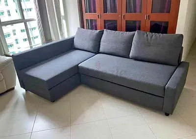 IKEA Gray FRIHETEN L Shape Sofa with storage bed. 204 x 140 cm