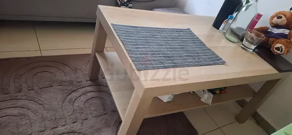 Ikea Light wood coffee table with lower shelf and woven panel