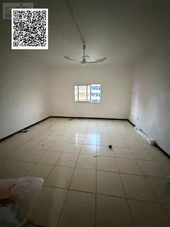 Studio for annual rent in Ajman, Al Rashidiya 3, Traffic Street, large area, behind Ajman One Towers