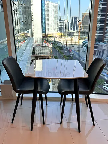 Dining table with 2 leather chairs