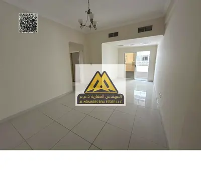 Two-bedroom apartment with hall in Al Nuaimiya 1, balcony with open view, built-in wardrobes, 2 bathrooms, central AC. 38,000 AED, 4 payments, familie