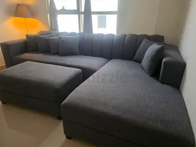 Gray L-shaped Corner Sofa with Ottoman - Good Condition