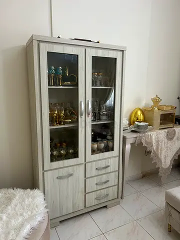 Light Wood Display Cabinet with Glass Doors and Drawers
