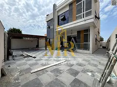 Own a luxurious, modern two-story villa with a rooftop terrace and garden, directly on Ammar Street.