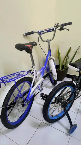 Childrens blue  white bicycle with training wheels - good condition