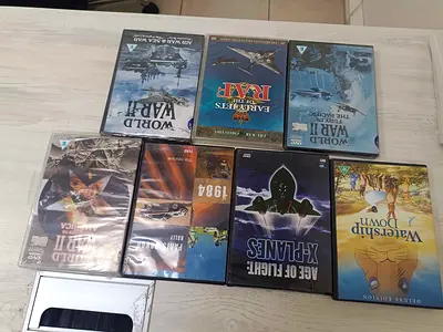 Collection of 8 Assorted DVD Movies (War, Action, Documentary, Classics)