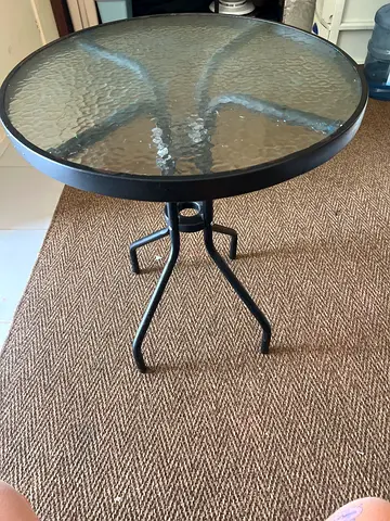 Round glass-top outdoor/patio side table with metal frame
