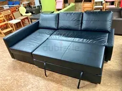 Black Leather L-Shaped Sofa Bed with Storage - Good Condition