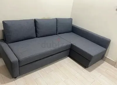 Grey L-shaped Sofa Bed with Storage - Good Condition