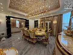 Two-story villa with a rooftop terrace and five bedrooms for sale in Al Yasmin, Ajman. The price is