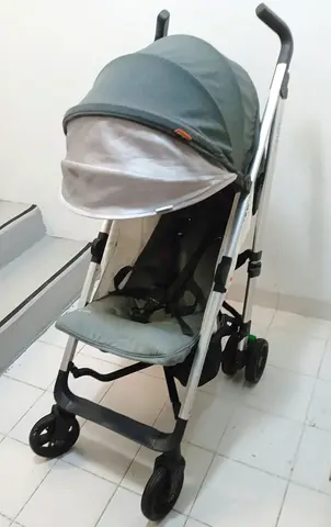 Lightweight compact baby stroller with sun canopy - good condition