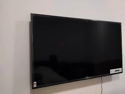 65 Wall-Mounted LED TV Brand New condition