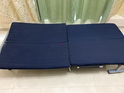 Foldable sofa cum bed