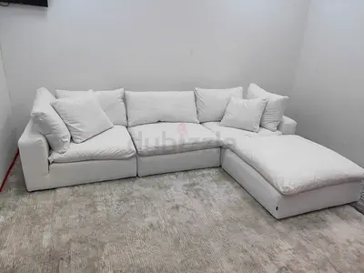 Marina Homes luscious linen modular sofa with ottoman