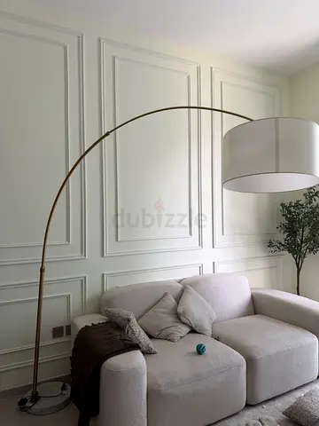 Arc floor lamp with large white drum shade