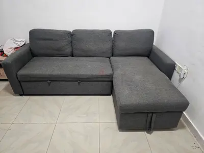 Grey L-shaped Sofa with Storage — Good Condition
