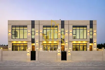 Own your dream villa and invest in style with this luxurious villa in the heart of Al Bahia, all fees included.  Luxury villa for sale in Al Bahia, Aj