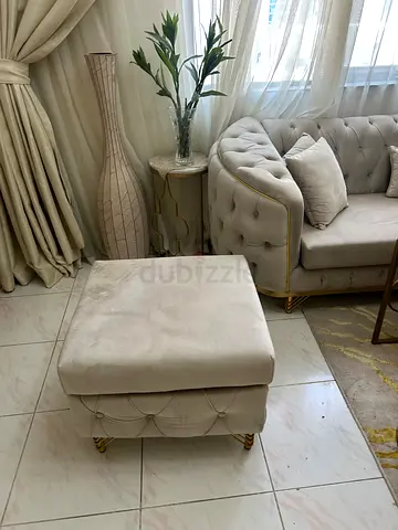 Beige Tufted Ottoman/Pouf with Gold Legs - Good Condition