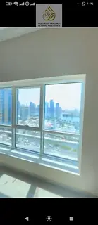 In Al Majaz 1, a two-bedroom master apartment with a view, three bathrooms, and a maid's room. A