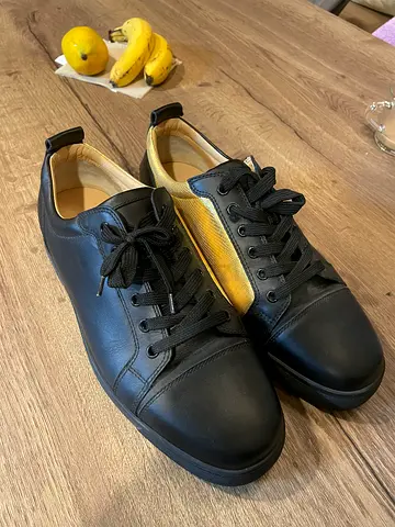 Christian Louboutin black and gold sneakers