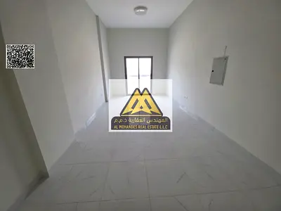 Two-bedroom apartment with hall in Al Jurf Industrial 3, second tenant, large space, balcony. 40,000 AED yearly, 4 payments, prime location, close to