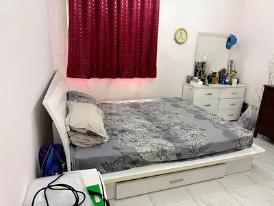 White wooden double bed frame with under-bed drawers (includes mattress), dressing table, side table