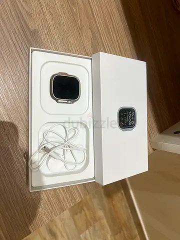 Used Apple Watch (Series-style) with charger - Good condition