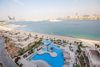 Luxury 3BR + Maid’s with Stunning Palm Views & Private Beach Access