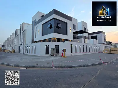Corner villa (with pool and elevator) for sale in Ajman | Al Helio 2 area | 6 bedrooms, majlis, 2 living rooms, and roof terrace | Freehold ownership
