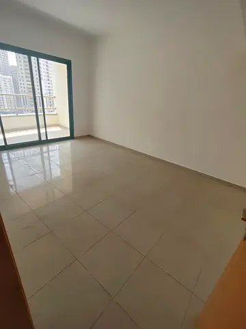 Luxury Living Opportunity in Al Majaz 3 Spacious 2 Bedroom Apartment with Balcony and Parking Included at an Attractive Price