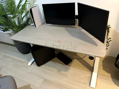 Height-Adjustable Standing Desk with Light Wood Top and White Frame