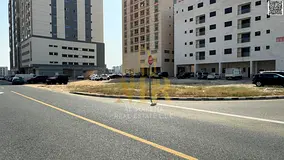 Corner residential/commercial plot for sale in Al Jurf Industrial Area 1, Ajman. Area: 11,000 sq ft.