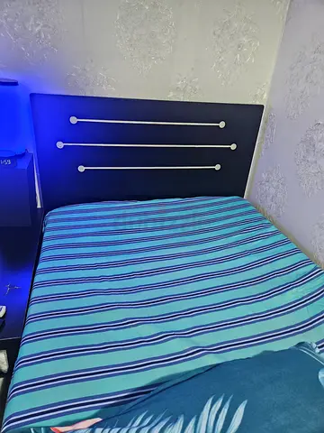 Double bed frame with headboard and mattress very new .