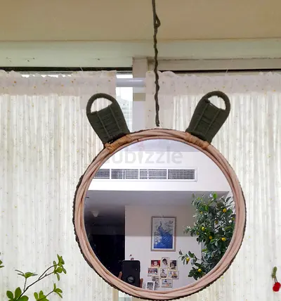 Rattan mirror with green Macrame