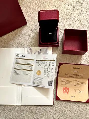 Diamond solitaire ring with GIA report and original Cartier box