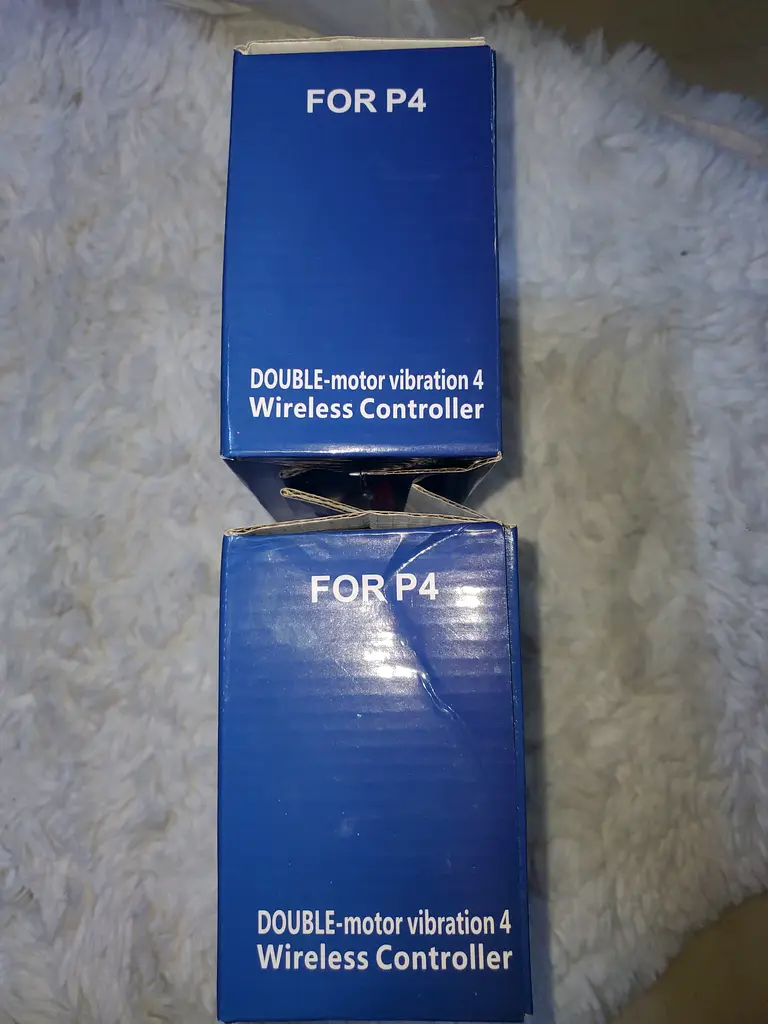 2pcs Wireless Controllers for PS4 (Double Motor Vibration) - New in Box | dubizzle Dubai 2pcs Wireless Controllers for PS4 (Double Motor Vibration) - New in Box | dubizzle Dubai