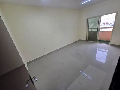 For annual rent in Al Nuaimiya 2, Ajman: Apartment - 1 bedroom and living room - Balcony with excellent view - Separate living room - Central air cond