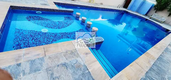 away from fly zone 3 bedrooms all master, tv lounge, pvt back yrd /fitted kitchen/shared swimming pool 2 covered parking/available for rent in mirdif