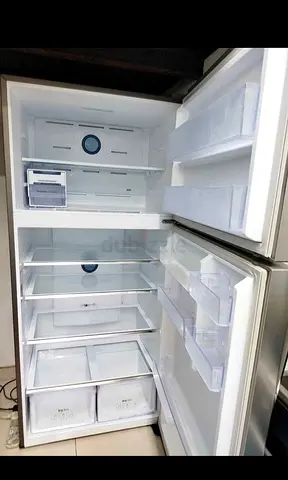 Used Top-Freezer Refrigerator - Spacious, Clean Interior with water dispenser free home delivery
