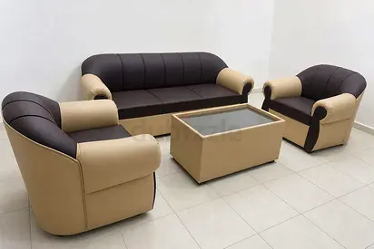 3-piece beige and brown leather sofa set with coffee table