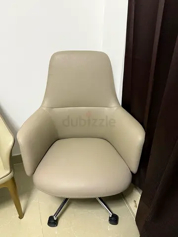 Beige Leather Swivel Office Chair with Armrests