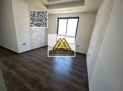 A premium 2-bedroom apartment with a living room for annual rent in Al Jurf 2 – Ajman, featuring two master bedrooms, built-in wardrobes, and high-end