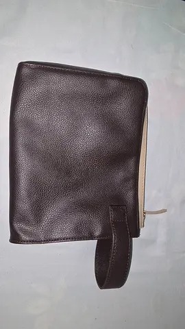Brown leather wristlet clutch with gold zipper — gently used