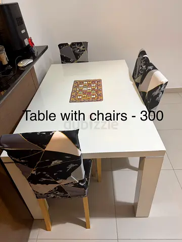 White Dining Table with 4 Chairs - Good Condition