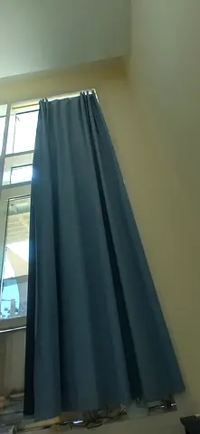 Blue blackout curtains in good condition