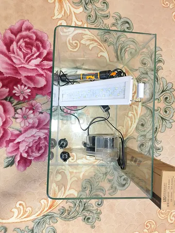 100AED Fish tank with pump, light and heater
