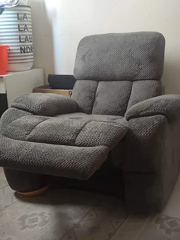 Comfortable grey reclining armchair with footrest - good condition